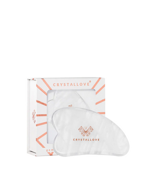 Tabla de masaje facial gua sha de cristal de roca con propiedades limpiadoras Crystallove