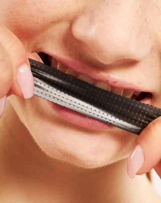 Tiras blanqueadoras de dientes The White(ning) Stripes Smilebite - set de 28 unidades