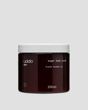 Exfoliante corporal de azúcar con aceite de macadamia, manteca de karité y aceite de aguacate Uddo